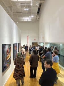 crowd of people in gallery